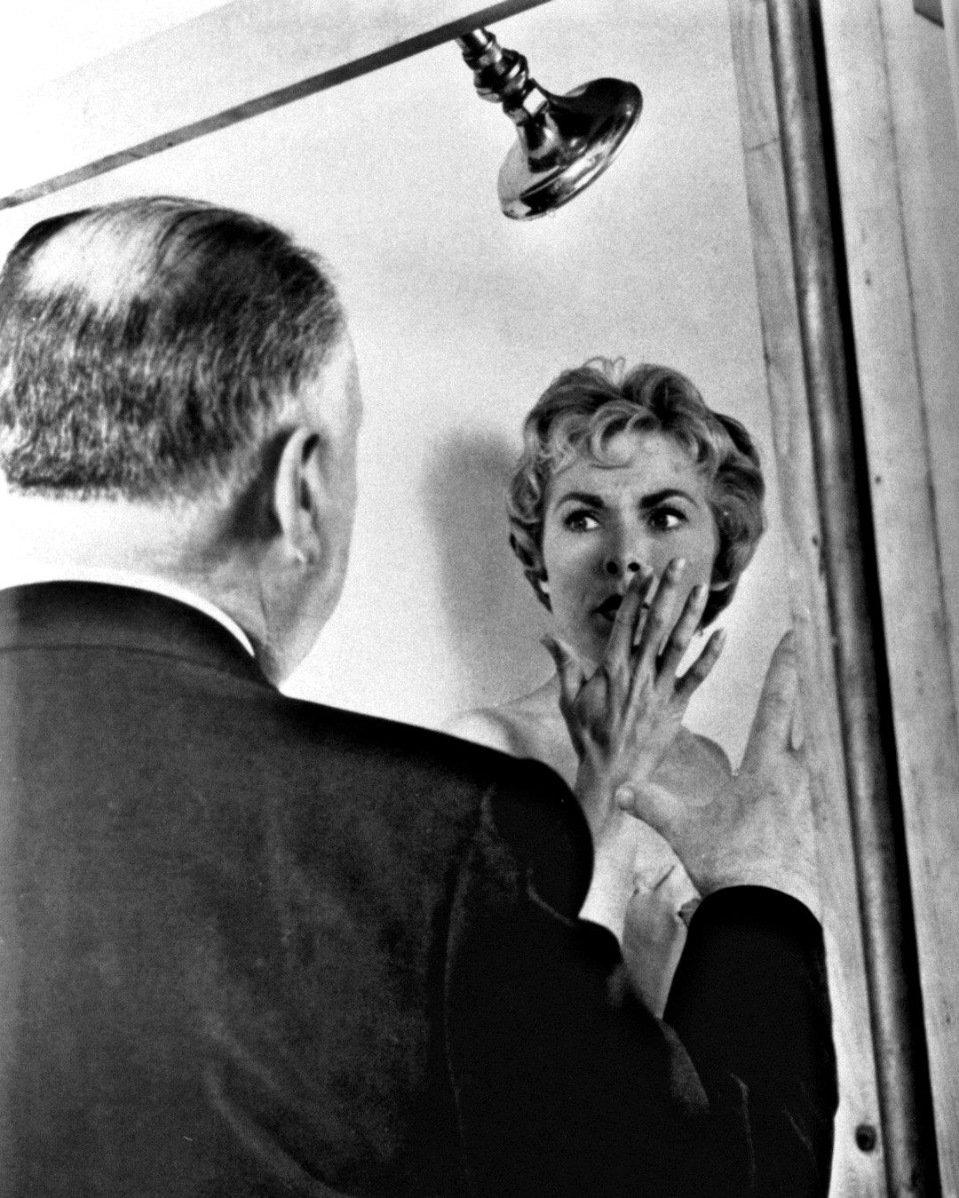 Alfred Hitchcock directs Janet Leigh in the shower scene on the set of Psycho, 1960